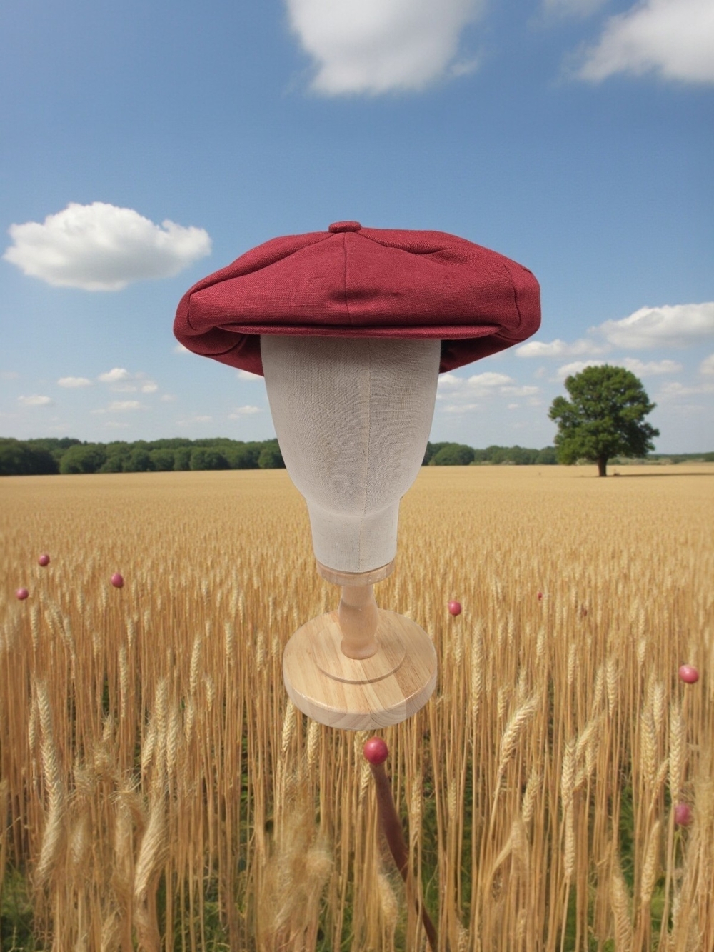 CAPAS LINEN BURGUNDY BIG APPLE NEWS BOY CAP.